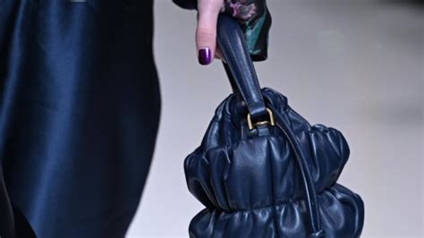 Giorgio Armani bags were produced by exploited .